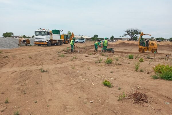 Compaction of the health centre platform prior to the laterite layers being spread & compacted